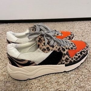 white raven tennis shoes